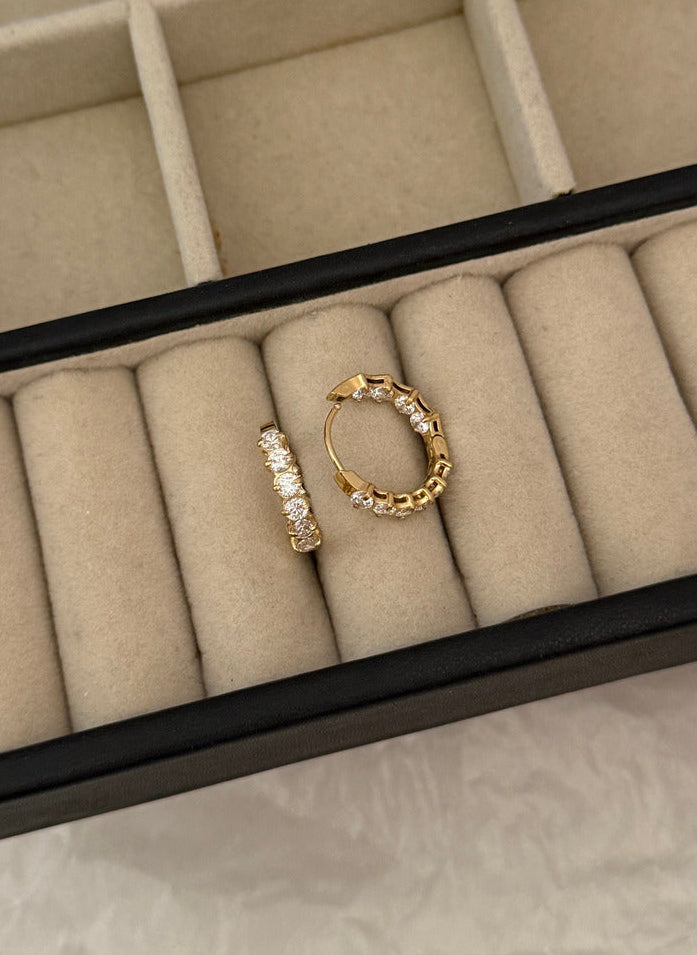 gold toned earrings from paush jewelry water resistant anti tarnish